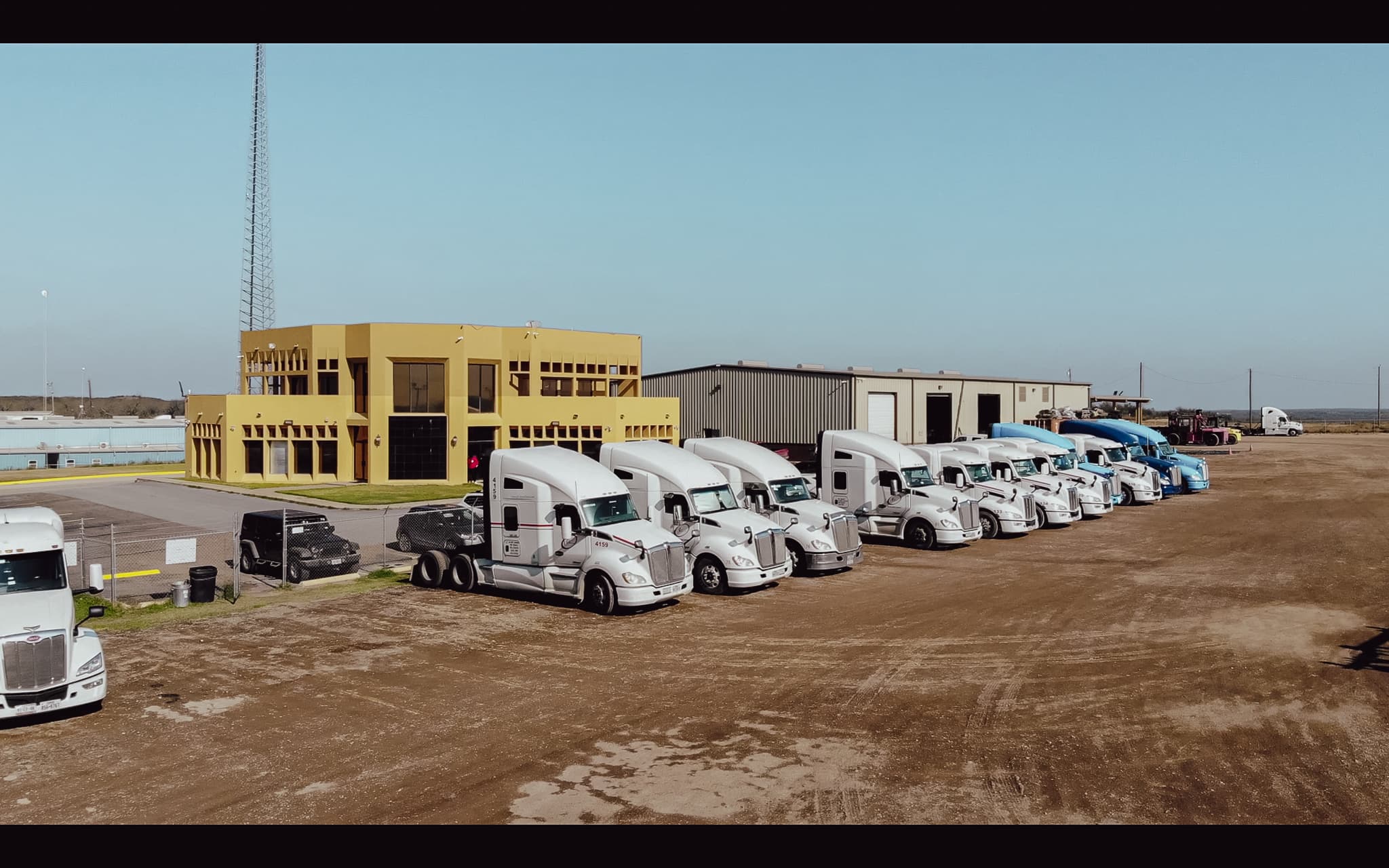 jit office with trucks parked
